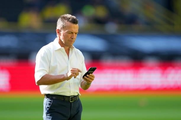 Lothar Matthaeus with mobile phone prior to the Bundesliga match between Borussia Dortmund and Eintracht Frankfurt at Signal Iduna Park on August 14,...