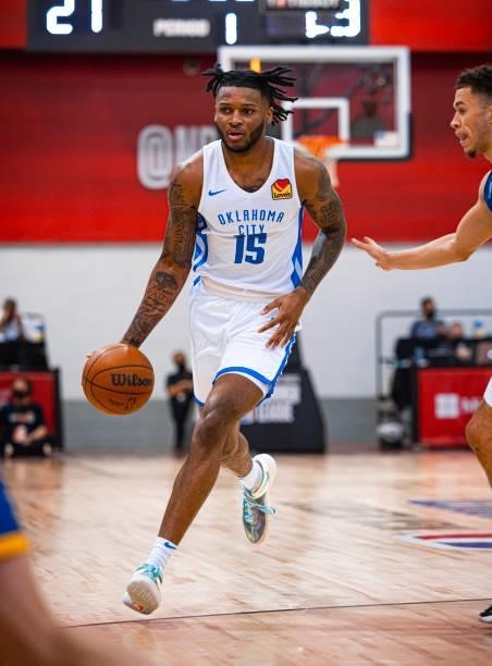 Josh Hall of the Oklahoma City Thunder dribbles the ball during the game against the Golden State Warriors during the 2021 Las Vegas Summer League on...