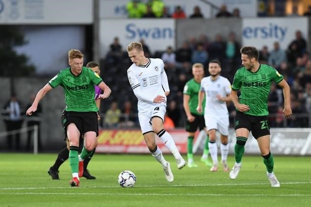 Flynn Downes of Swansea City in action during the Sky Bet Championship match between Swansea City and Stoke City at the Swansea.com Stadium on August...