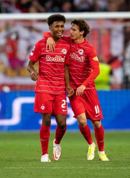 Karim Adeyemi of Salzburg celebrates his team's first goal with teammate Brenden Aaronson of Salzburg during the UEFA Champions League Play-Offs Leg...