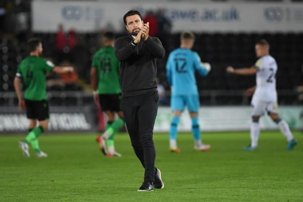 Russell Martin Head Coach of Swansea City applauds the fans at the final whistle during the Sky Bet Championship match between Swansea City and Stoke...