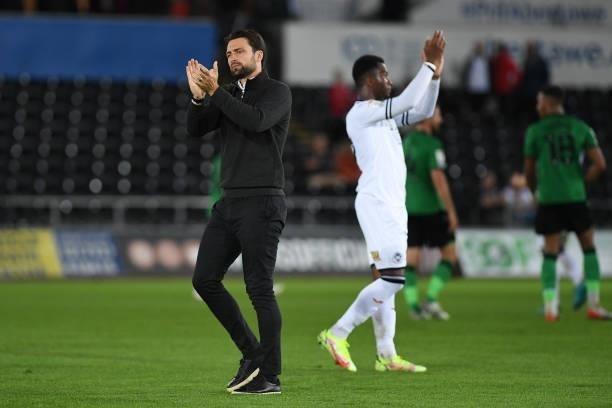 Russell Martin Head Coach of Swansea City applauds the fans at the final whistle during the Sky Bet Championship match between Swansea City and Stoke...