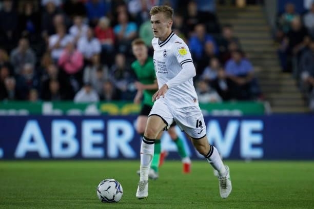 Flynn Downes of Swansea City in action during the Sky Bet Championship match between Swansea City and Stoke City at the Swansea.com Stadium on August...