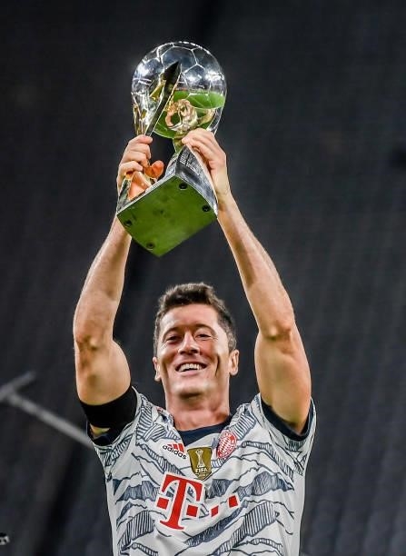 Robert Lewandowski of München lifts the trophy after the Supercup 2021 match between FC Bayern München and Borussia Dortmund at Signal Iduna Park on...