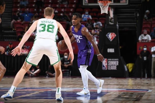 Sam Hauser of the Boston Celtics plays defense on Davion Mitchell of the Sacramento Kings during the 2021 Las Vegas Summer League Championship Game...