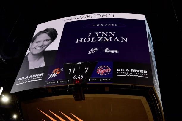 Vice President for NCAA Women's Basketball Lynn Holzman is honored during Believe in Women Night at the Phoenix Mercury game against the Indiana...