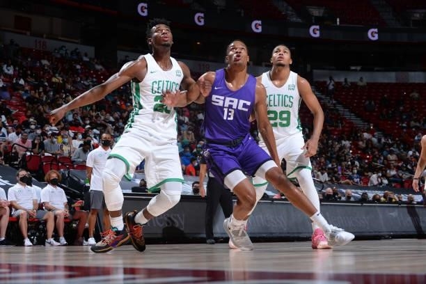 Robert Woodard II of the Sacramento Kings and Juhann Begarin of the Boston Celtics look up during the 2021 Las Vegas Summer League Championship Game...