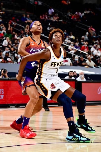 Shey Peddy of the Phoenix Mercury and Danielle Robinson of the Indiana Fever fight for position during the game on August 17, 2021 at Footprint...