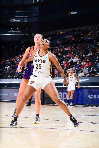 Sophie Cunningham of the Phoenix Mercury and Victoria Vivians of the Indiana Fever fight for position during the game on August 17, 2021 at Footprint...