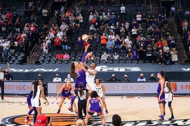 Brittney Griner of the Phoenix Mercury and Teaira McCowan of the Indiana Fever reach for the tip off during the game on August 17, 2021 at Footprint...