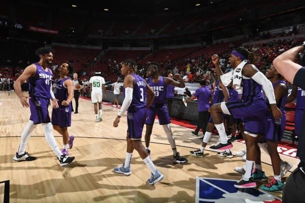 Princepal Singh of the Sacramento Kings celebrates with Jahmius Ramsey and Marcus Graves after winning the 2021 Las Vegas Summer League Championship...