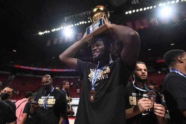 Neemias Queta of the Sacramento Kings celebrates with the MGM Resorts 2021 Summer League Championship Trophy after winning the 2021 Las Vegas Summer...