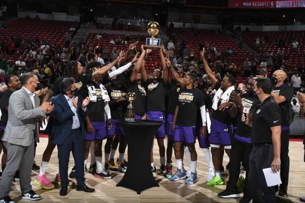 Louis King and the Sacramento Kings celebrate with the MGM Resorts 2021 Summer League Championship Trophy after winning the 2021 Las Vegas Summer...