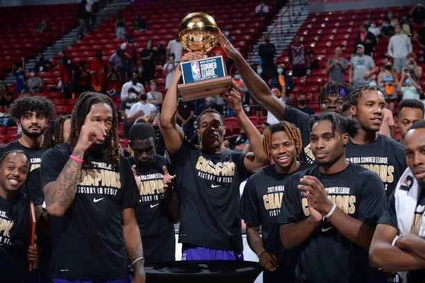 The Sacramento Kings celebrate winning the MGM Resorts 2021 Summer League Championship Trophy after the 2021 Las Vegas Summer League Championship...