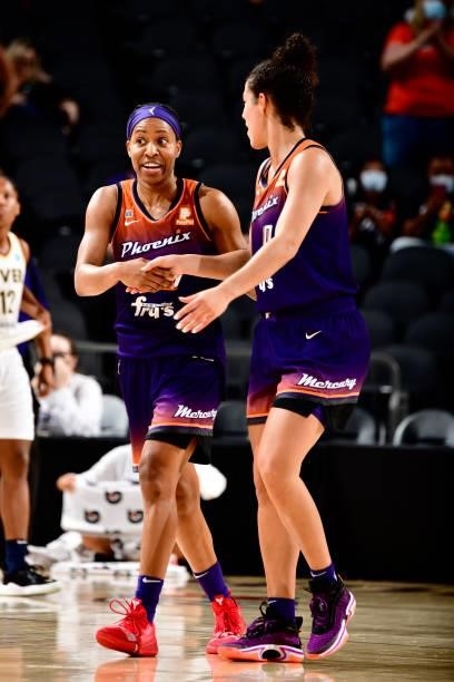 Shey Peddy of the Phoenix Mercury celebrates with teammate Kia Nurse after the game against the Indiana Fever on August 17, 2021 at Footprint Center...