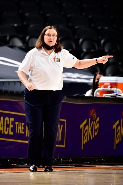 Head Coach Marianne Stanley of the Indiana Fever talks to players during the game against the Phoenix Mercury on August 17, 2021 at Footprint Center...