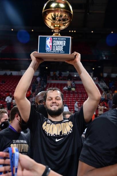 Jordan Schakel of the Sacramento Kings celebrates with the MGM Resorts 2021 Summer League Championship Trophy after winning the 2021 Las Vegas Summer...