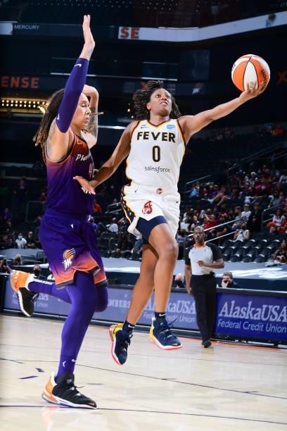 Kelsey Mitchell of the Indiana Fever drives to the basket during the game against the Phoenix Mercury on August 17, 2021 at Footprint Center in...
