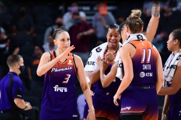 Diana Taurasi of the Phoenix Mercury high fives Alanna Smith of the Phoenix Mercury after the game against the Indiana Fever on August 17, 2021 at...