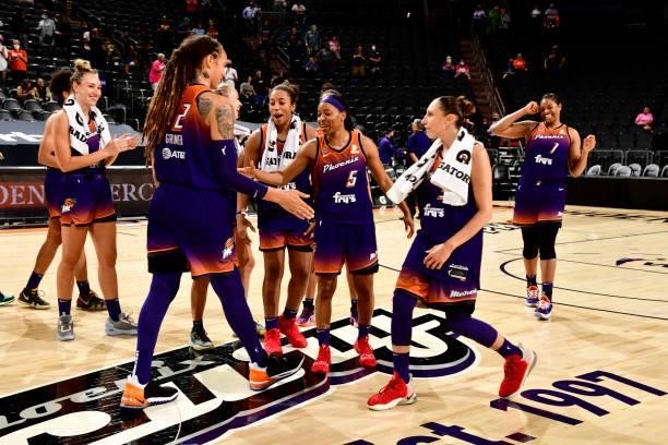 The Phoenix Mercury celebrate after the game against the Indiana Fever on August 17, 2021 at Footprint Center in Phoenix, Arizona. NOTE TO USER: User...