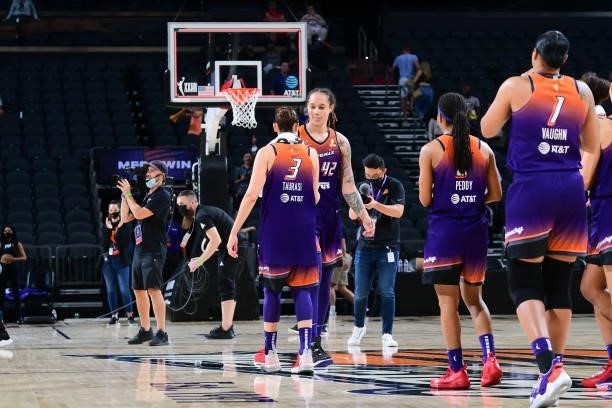 Diana Taurasi of the Phoenix Mercury high fives Brittney Griner of the Phoenix Mercury after the game against the Indiana Fever on August 17, 2021 at...