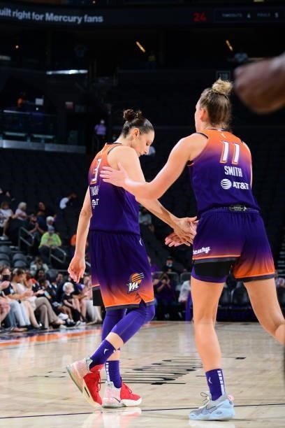 Alanna Smith of the Phoenix Mercury high fives Diana Taurasi of the Phoenix Mercury during the game against the Indiana Fever on August 17, 2021 at...