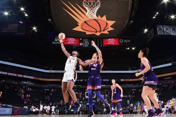 Teaira McCowan of the Indiana Fever drives to the basket during the game against the Phoenix Mercury on August 17, 2021 at Footprint Center in...