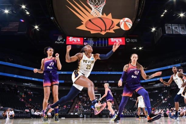 Tiffany Mitchell of the Indiana Fever rebounds the ball during the game against the Phoenix Mercury on August 17, 2021 at Footprint Center in...