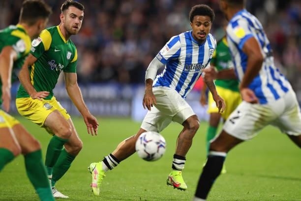 Ben Whiteman of Preston North End and Josh Koroma of Huddersfield Town during the Sky Bet Championship match between Huddersfield Town and Preston...