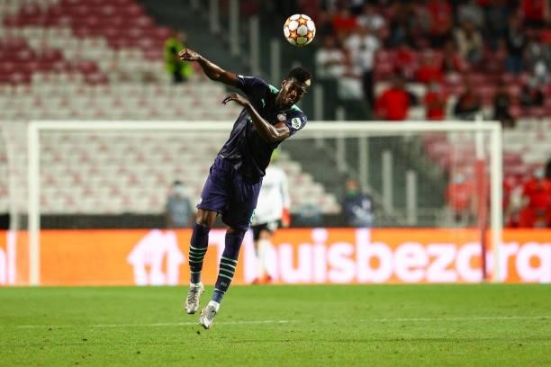 Ibrahim Sangare of PSV Eindhoven heads the ball during the UEFA Champions League Play-Offs Leg One match between SL Benfica and PSV Eindhoven at...