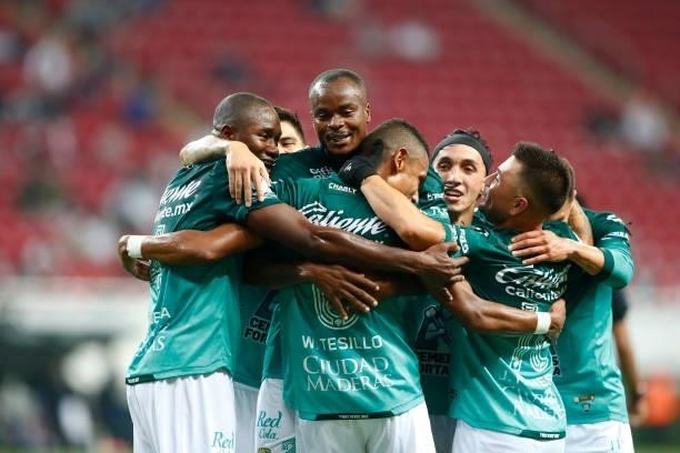 William Tesillo of Leon celebrates with his teammates after scoring the first goal of his team during the 5th round match between Chivas and Leon as...
