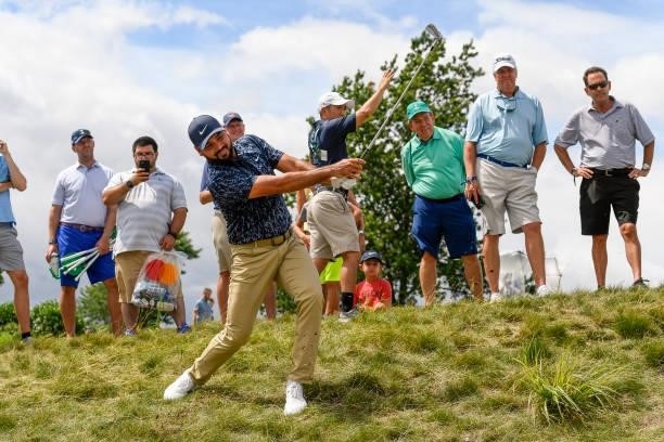 Jason Day of Australia hits his second shot at the 18th hole during the first round of THE NORTHERN TRUST at Liberty National Golf Club on August 19,...