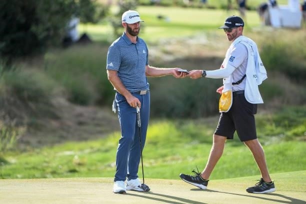 Dustin Johnson at the 17th hole during the first round of THE NORTHERN TRUST at Liberty National Golf Club on August 19, 2021 in Jersey City, New...