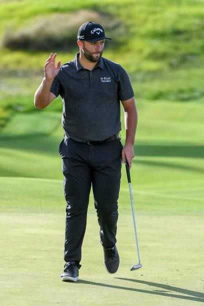 Jon Rahm of Spain makes birdie at the 17th green during the first round of THE NORTHERN TRUST at Liberty National Golf Club on August 19, 2021 in...