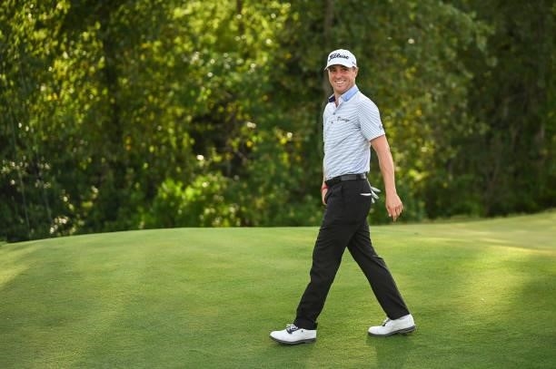Justin Thomas smiles after making a birdie putt on the 17th hole green during the first round of THE NORTHERN TRUST, the first event of the FedExCup...