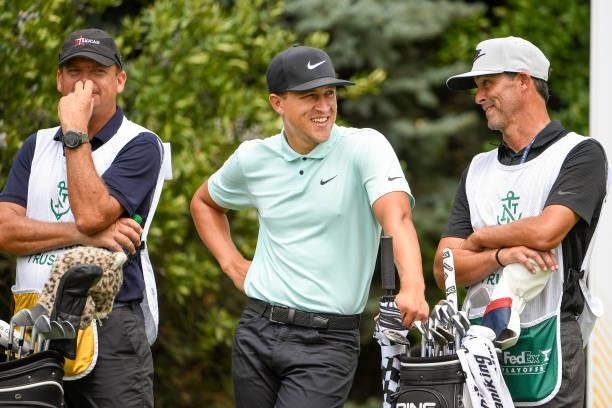 Cameron Champ smiles at the ninth tee during the first round of THE NORTHERN TRUST at Liberty National Golf Club on August 19, 2021 in Jersey City,...