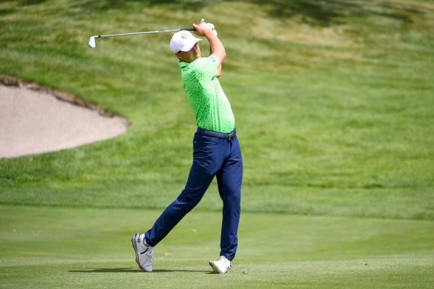 Jordan Spieth hits his second shot at the eighth hole during the first round of THE NORTHERN TRUST at Liberty National Golf Club on August 19, 2021...