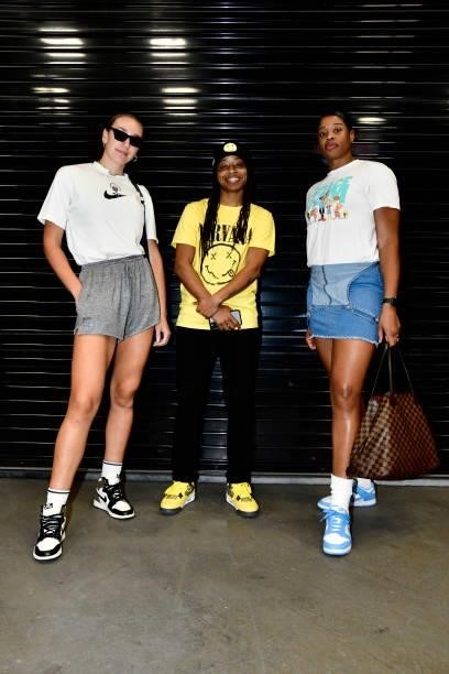 Bria Hartley, Kia Vaughn, and Shey Peddy of the Phoenix Mercury pose for a photo before the game against the Washington Mystics on August 19, 2021 at...