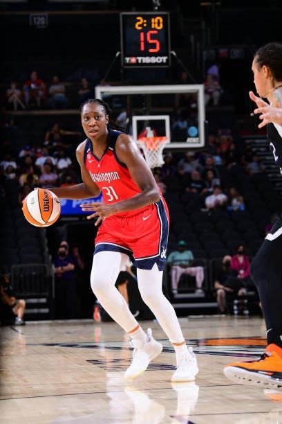 Tina Charles of the Washington Mystics dribbles during the game against the Phoenix Mercury on August 19, 2021 at Phoenix Suns Arena in Phoenix,...