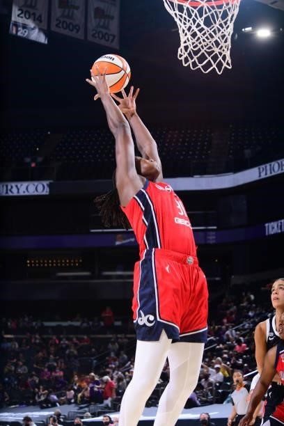 Tina Charles of the Washington Mystics rebounds during the game against the Phoenix Mercury on August 19, 2021 at Phoenix Suns Arena in Phoenix,...