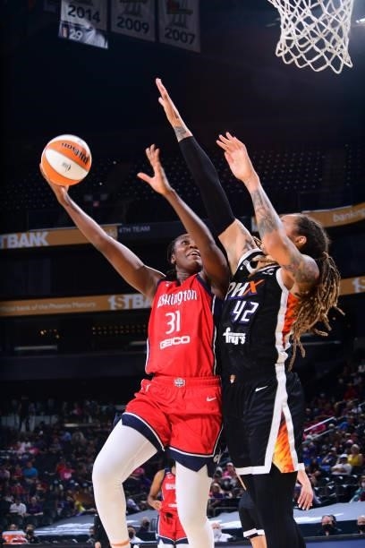 Tina Charles of the Washington Mystics drives to the basket during the game against the Phoenix Mercury on August 19, 2021 at Phoenix Suns Arena in...