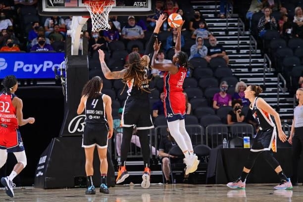 Tina Charles of the Washington Mystics shoots the ball during the game against the Phoenix Mercury on August 19, 2021 at Phoenix Suns Arena in...