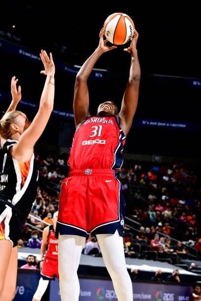 Tina Charles of the Washington Mystics rebounds the ball during the game against the Phoenix Mercury on August 19, 2021 at Footprint Center in...