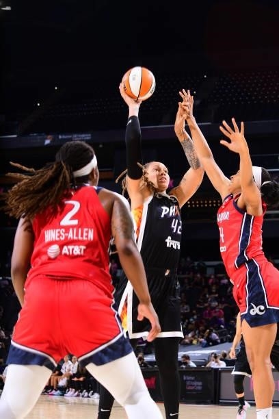 Brittney Griner of the Phoenix Mercury shoots the ball during the game against the Washington Mystics on August 19, 2021 at Phoenix Suns Arena in...