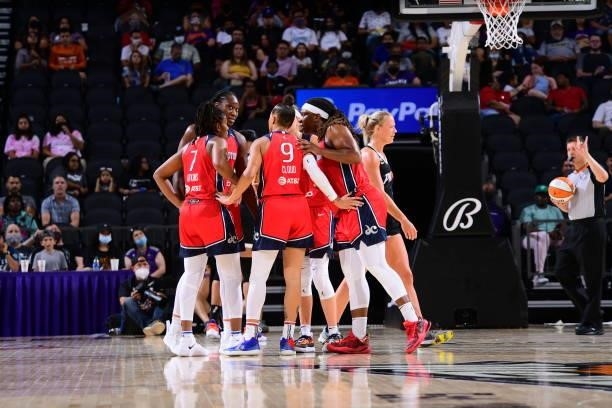 The Washington Mystics huddle up during the game against the Phoenix Mercury on August 19, 2021 at Phoenix Suns Arena in Phoenix, Arizona. NOTE TO...