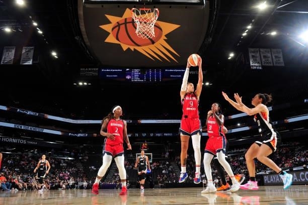 Natasha Cloud of the Washington Mystics rebounds the ball during the game against the Phoenix Mercury on August 19, 2021 at Footprint Center in...