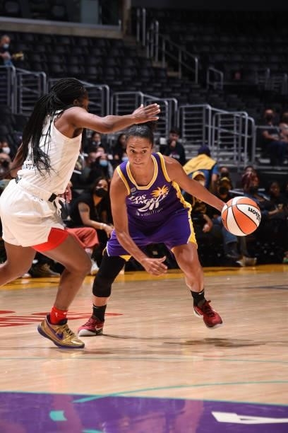 Kristi Toliver of the Los Angeles Sparks dribbles the ball against the Atlanta Dream on August 19, 2021 at the Staples Center in Los Angeles,...