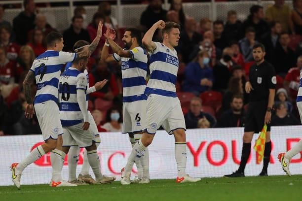 Queens Park Rangers' Rob Dickie celebrates after their second goal during the Sky Bet Championship match between Middlesbrough and Queens Park...