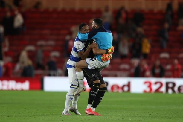 Queens Park Rangers' Seny Dieng, Ilias Chair and Chris Willock celebrates after the final whistle of the Sky Bet Championship match between...