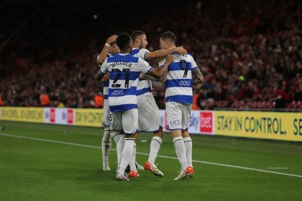 Queens Park Rangers' Lyndon Dykes and Lee Wallace celebrate after their first goal during the Sky Bet Championship match between Middlesbrough and...